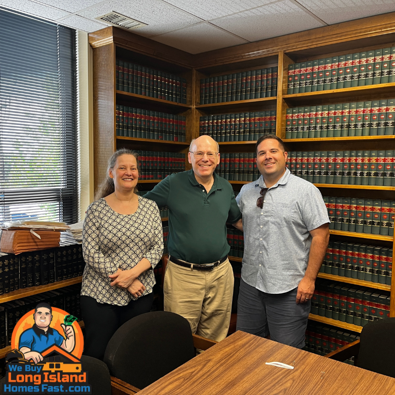 Mike Plactere with two sellers at a closing